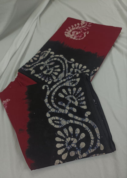 Red and black patterned fabric on a white background