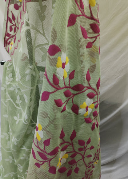 Green fabric with floral pattern on a white background