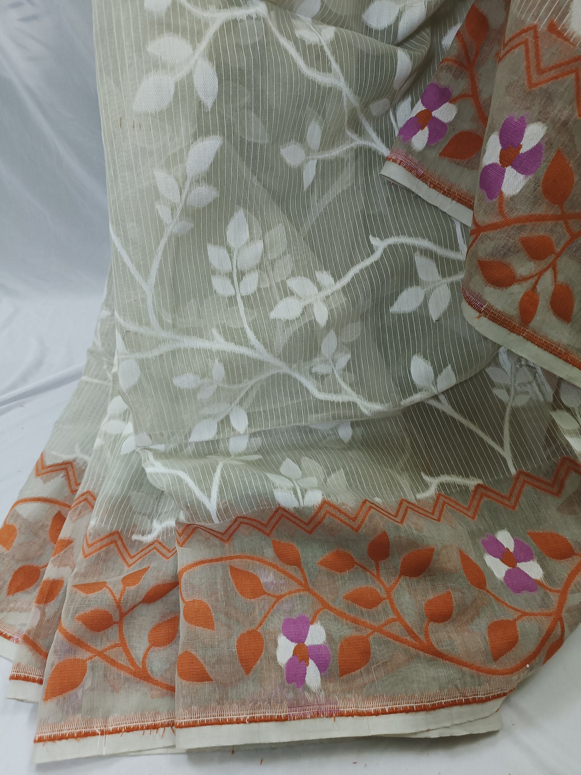 Saree with floral patterns on a white background