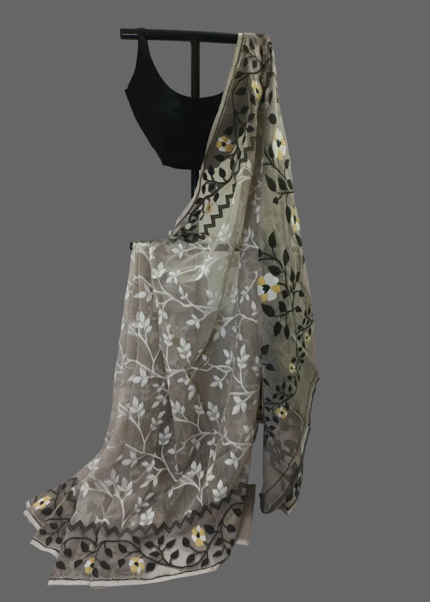 Embroidered fabric with floral patterns on a white background