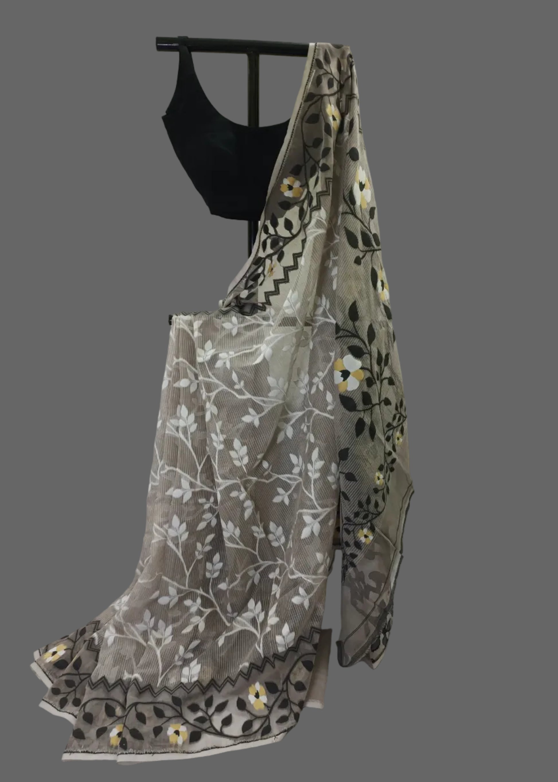 Embroidered fabric with floral patterns on a white background