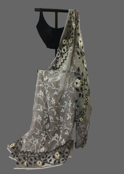 Embroidered fabric with floral patterns on a white background