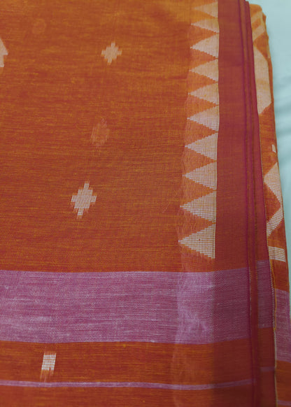 Traditional fabric with intricate patterns on a plain background