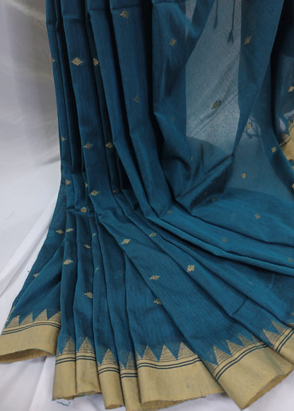 Teal saree with gold border on a white background