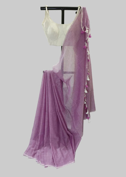 Purple saree with a white blouse on a white background