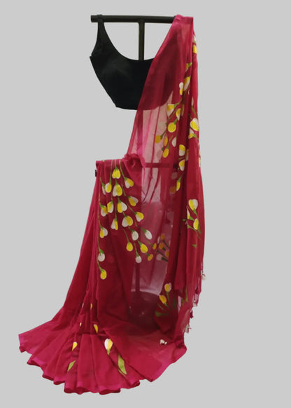 Red saree with yellow patterns on a white background