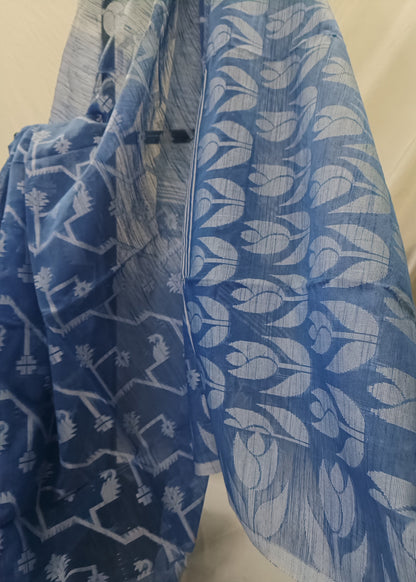 Blue fabric with white patterns draped over a surface