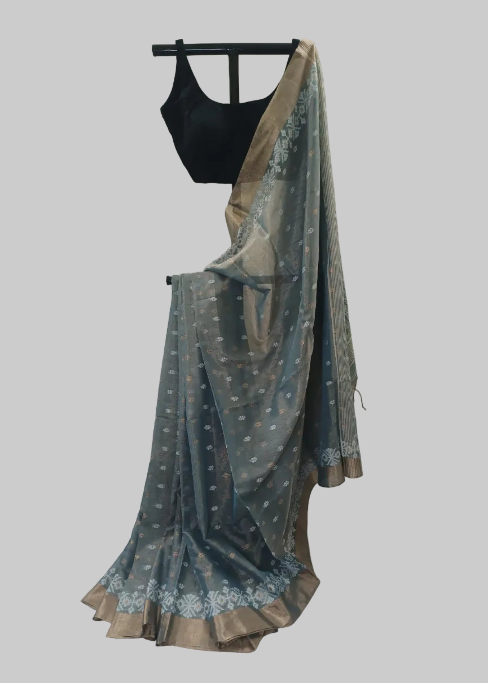 Saree with a black blouse on a white background