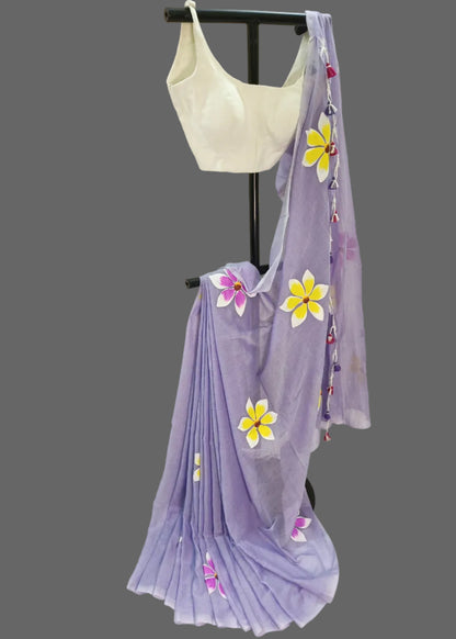 Light purple saree with floral patterns on a white background