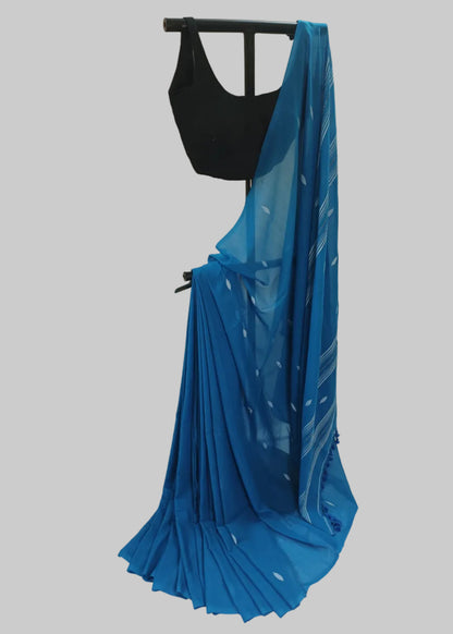 Blue saree with a black blouse on a white background