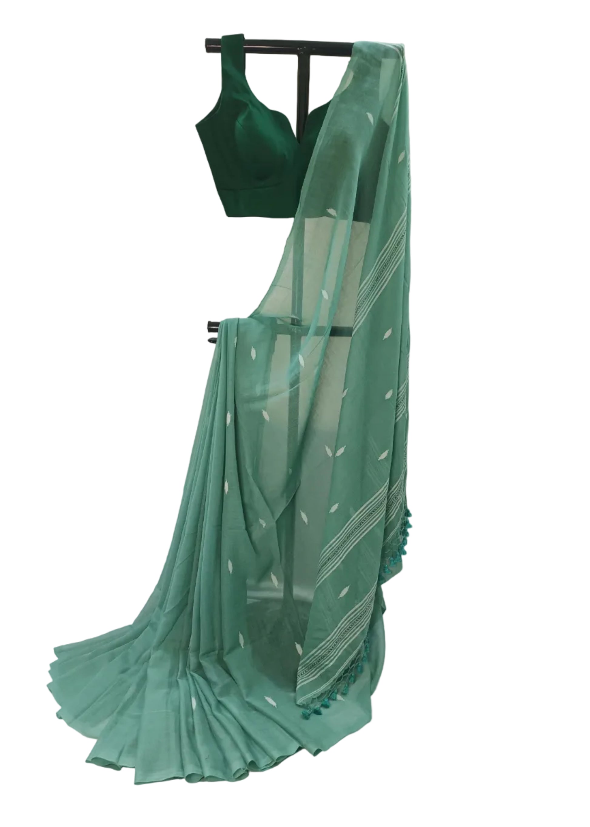 Green saree with a matching blouse on a white background