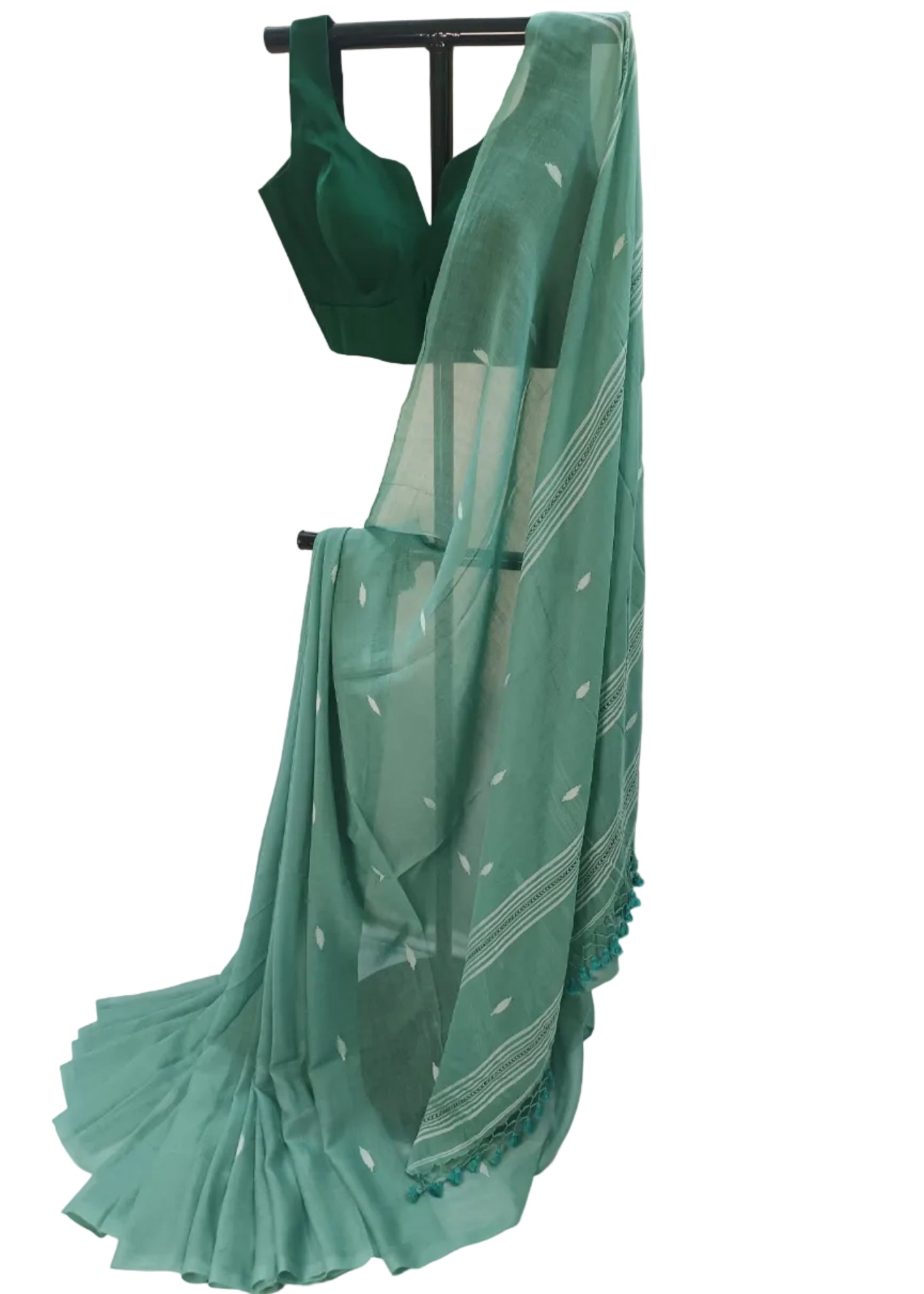 Green saree with a matching blouse on a white background