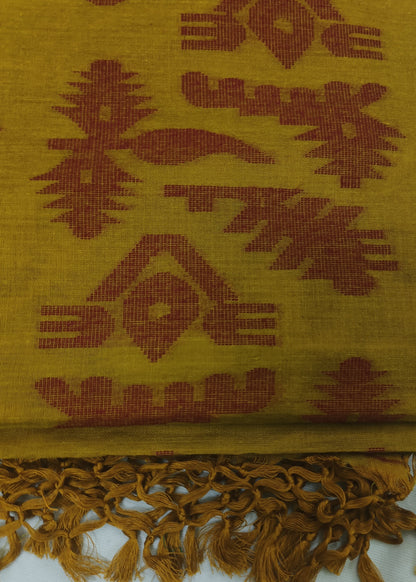 A folded mustard yellow woven textile with a rust-brown geometric pattern and fringed tassels along one edge, shown on a white background.