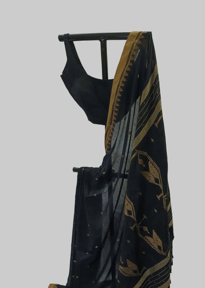 Black saree with gold patterns on a white background