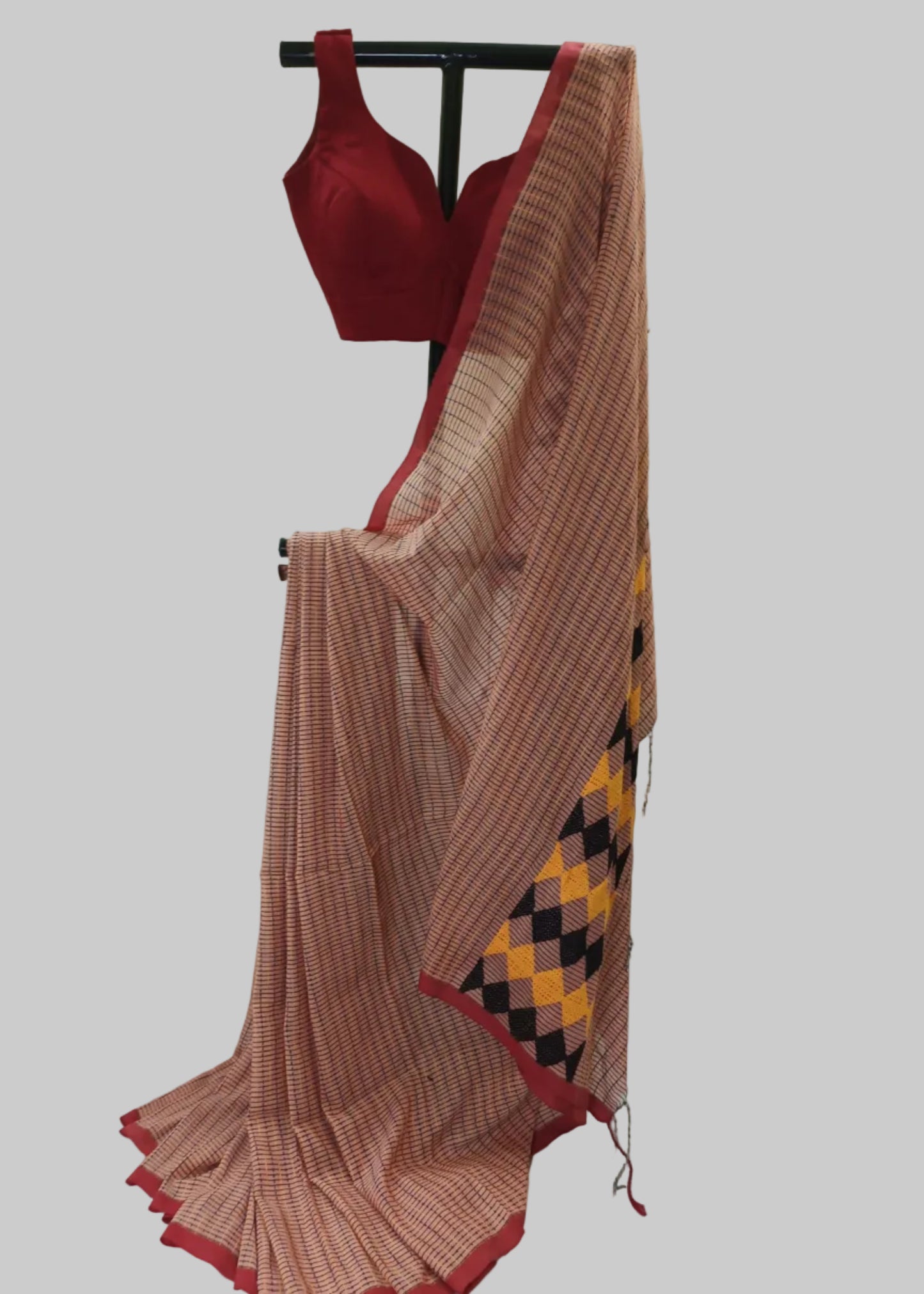 Saree with a red blouse on a white background