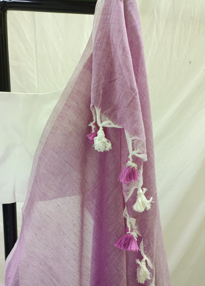 Purple saree with tassels on a white background