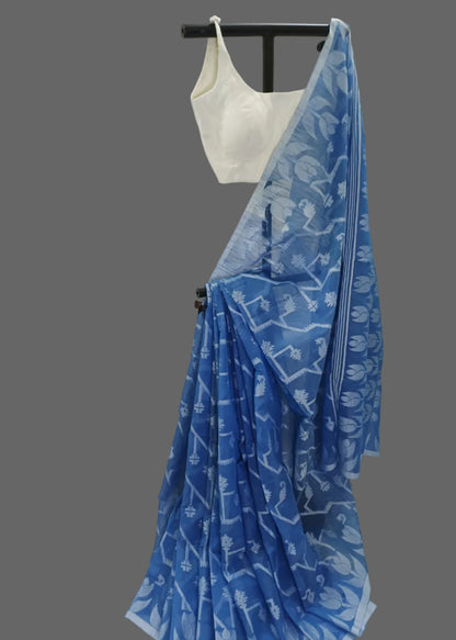 Blue saree with white patterns on a white background